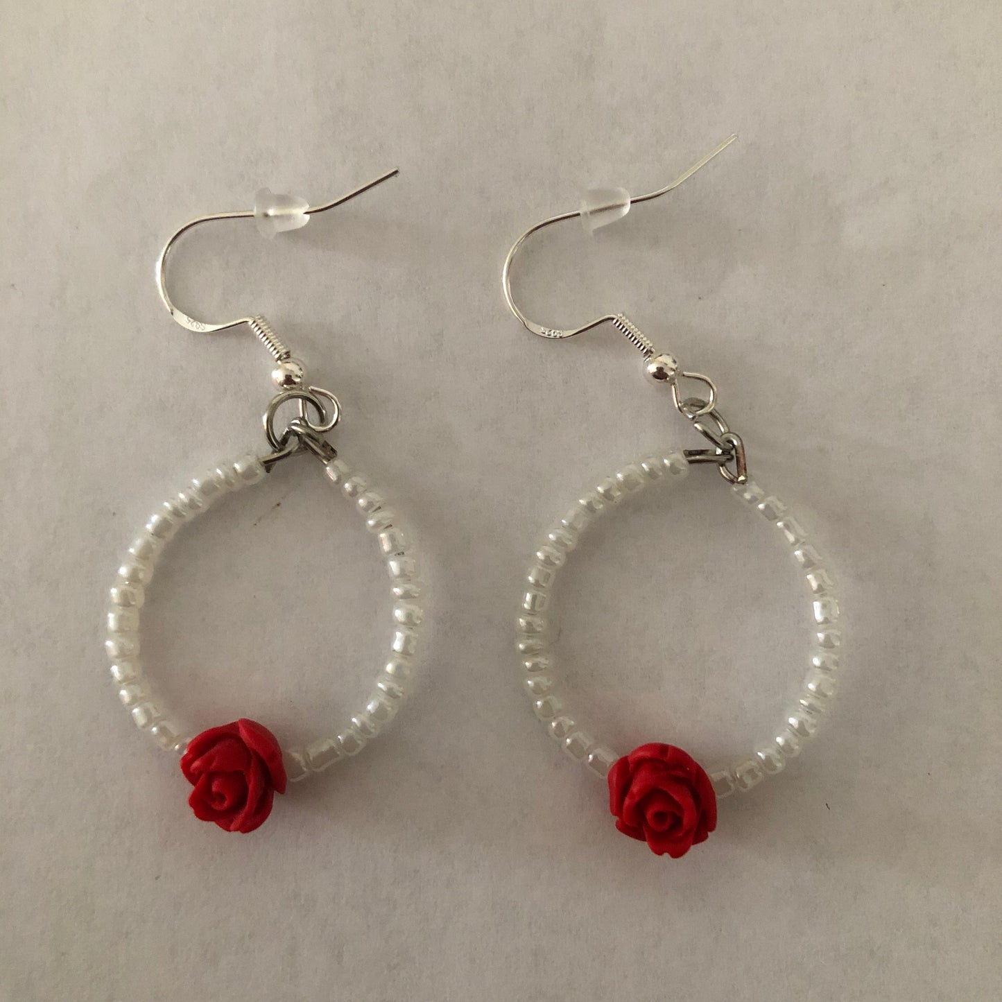 Valentine’s Day hoop earrings with a rose